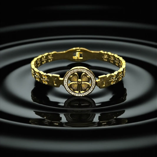 Anti tarnish Gold Colour Bracelet with a four-leaf clover design on a black background